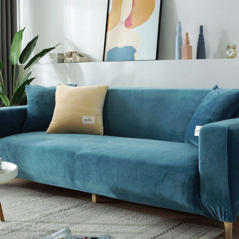 Universal four-season sofa cover made of combined leather and flannel